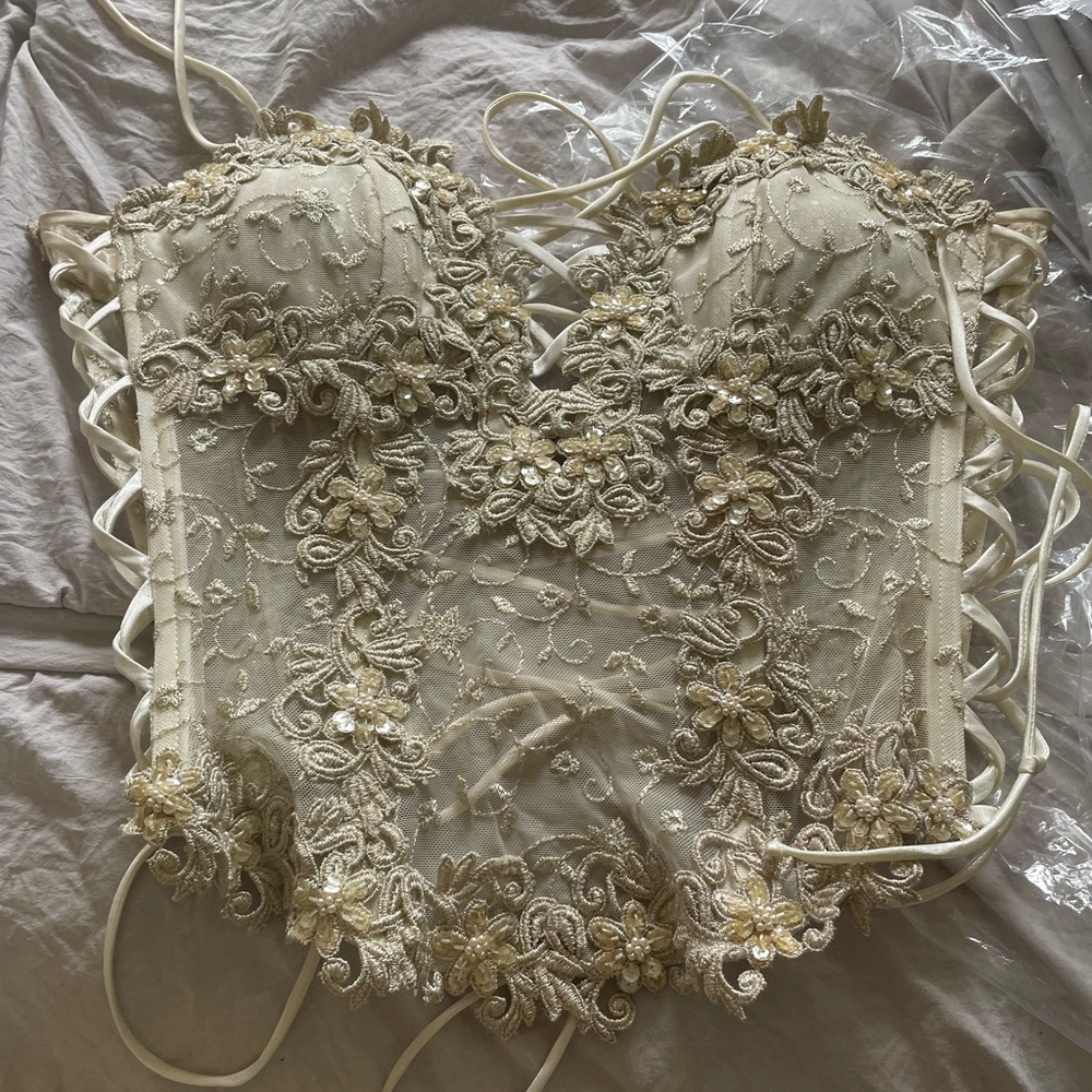Zini Elegant Lace-Up top, size L but pulls in to fit S, purchased in Cape Town